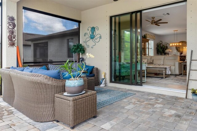 view of patio / terrace featuring outdoor lounge area and ceiling fan