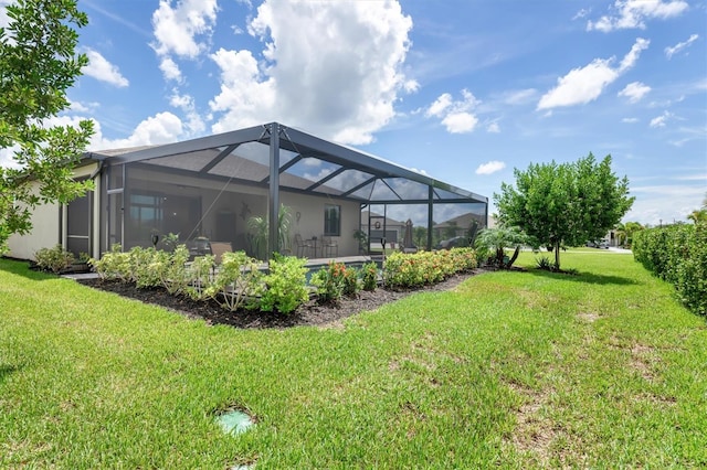 view of yard featuring glass enclosure