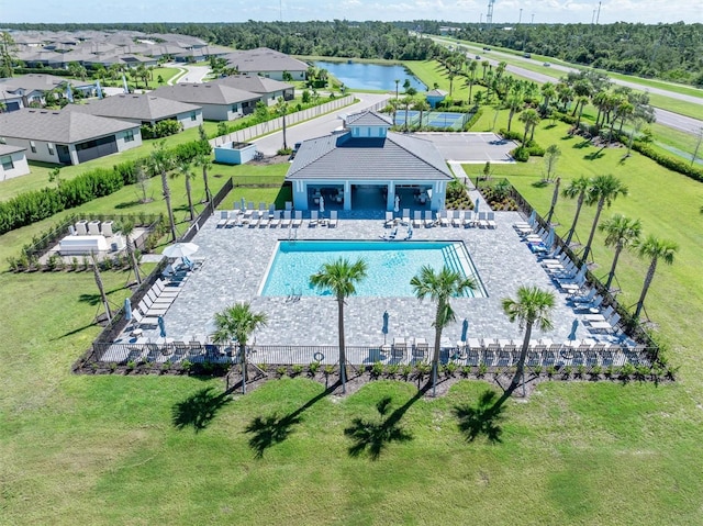 birds eye view of property featuring a water view