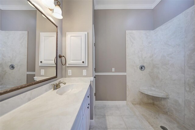 bathroom featuring tile patterned flooring, ornamental molding, a shower, and vanity