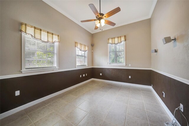 spare room featuring ceiling fan and light tile patterned flooring