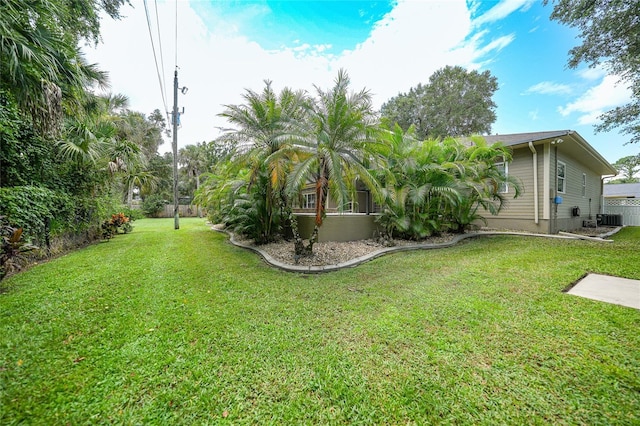 view of yard featuring central AC