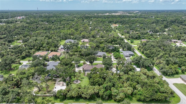 aerial view featuring a residential view and a view of trees