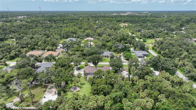 bird's eye view with a residential view and a view of trees