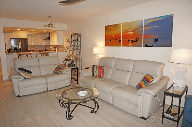 living room with light hardwood / wood-style floors