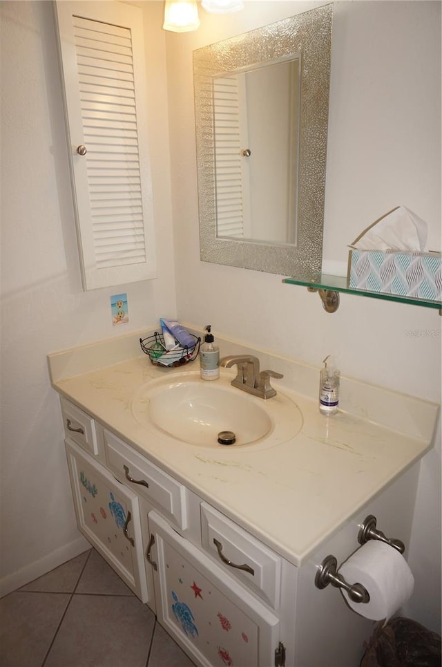 bathroom featuring tile patterned floors and vanity