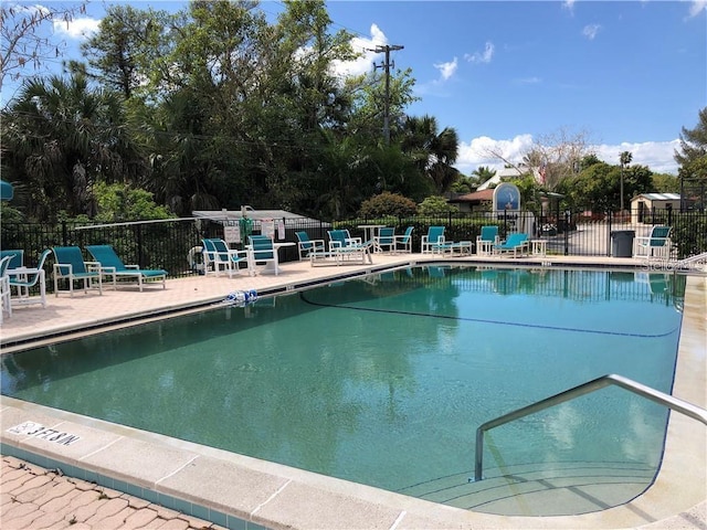 view of swimming pool featuring a patio