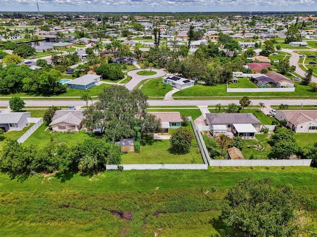 aerial view with a water view and a residential view