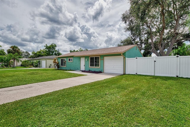 single story home with concrete driveway, a front yard, a gate, fence, and a garage