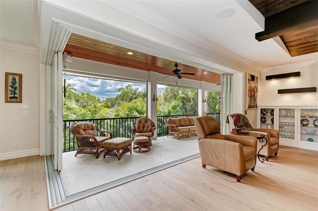 interior space with ceiling fan