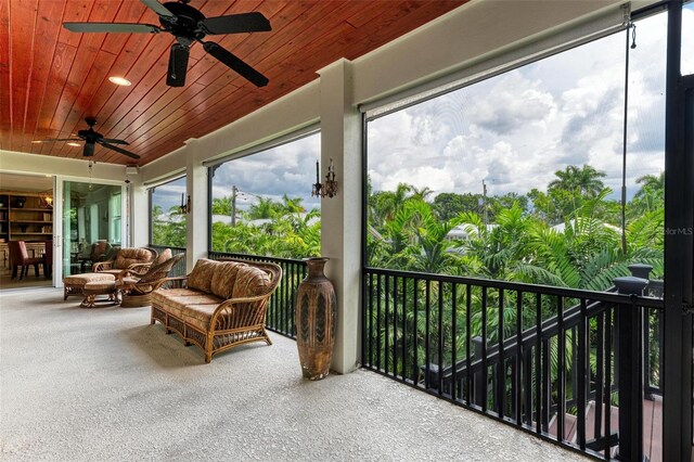 sunroom / solarium featuring wooden ceiling