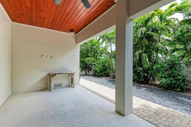 view of patio with visible vents and a ceiling fan