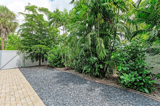 view of yard featuring a gate and fence