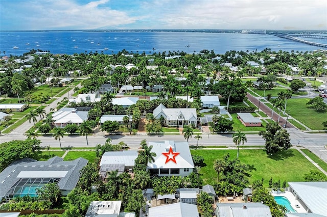 birds eye view of property featuring a residential view and a water view