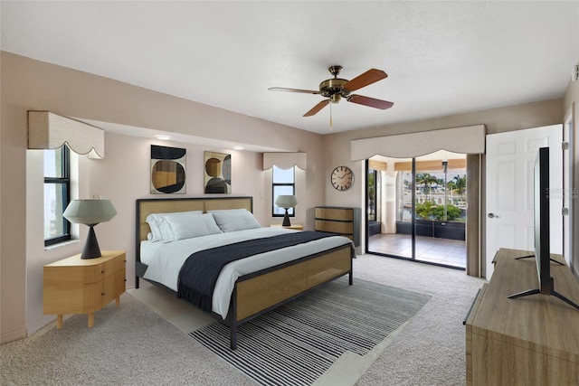 bedroom featuring light carpet, ceiling fan, and access to outside