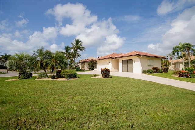 view of front facade with a front yard and a garage