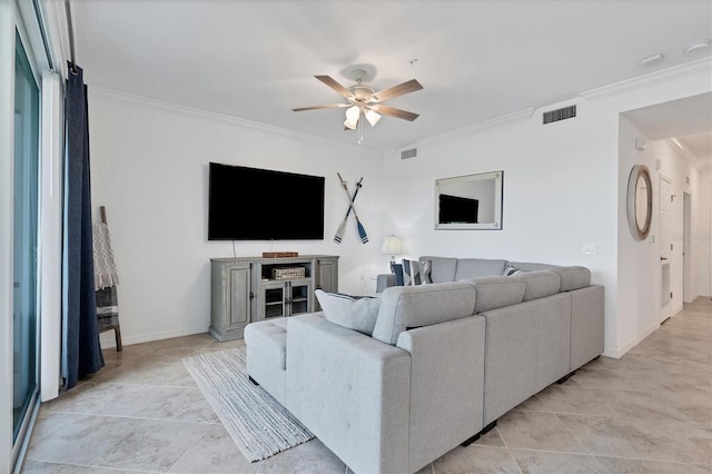 living room with crown molding and ceiling fan