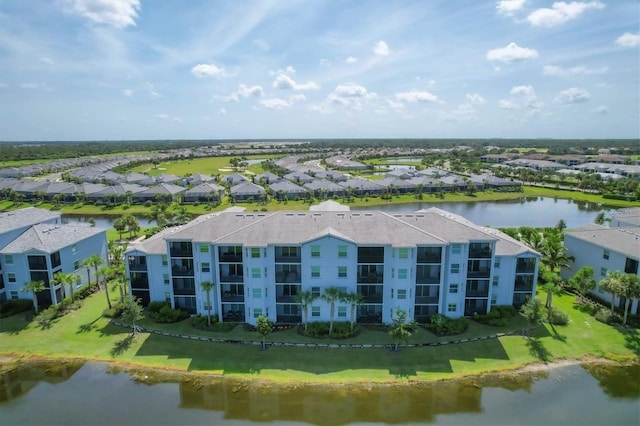 bird's eye view with a water view