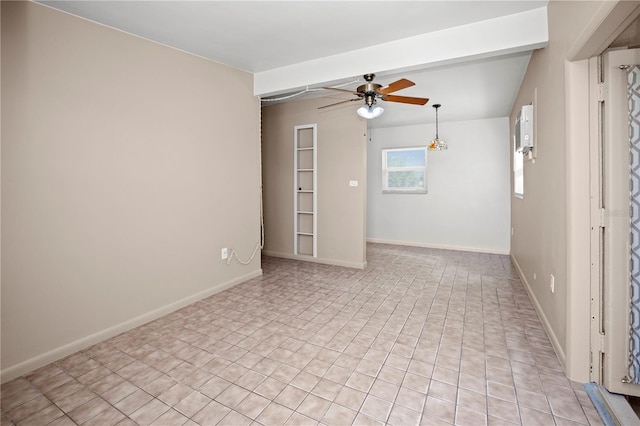 tiled empty room with ceiling fan