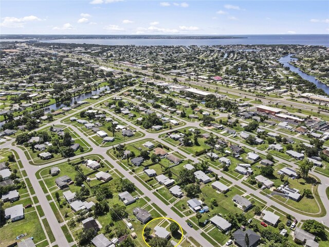 drone / aerial view with a water view