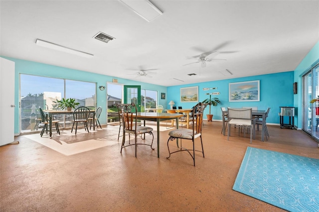 dining space with ceiling fan