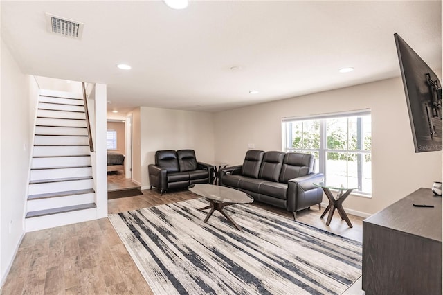 living room featuring light wood-type flooring