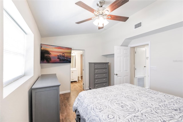 bedroom featuring lofted ceiling, hardwood / wood-style floors, and ceiling fan