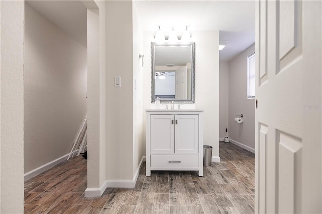 bathroom featuring vanity and hardwood / wood-style floors