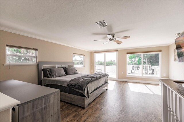 bedroom with access to outside, dark wood-style flooring, and crown molding