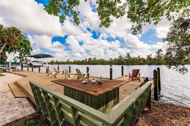 view of dock with a water view