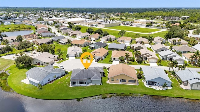 aerial view featuring a residential view and a water view