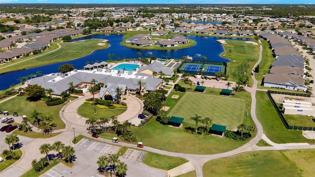 bird's eye view featuring a residential view and a water view