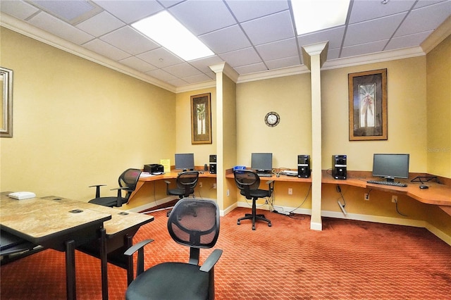 carpeted office with a paneled ceiling, baseboards, and ornamental molding