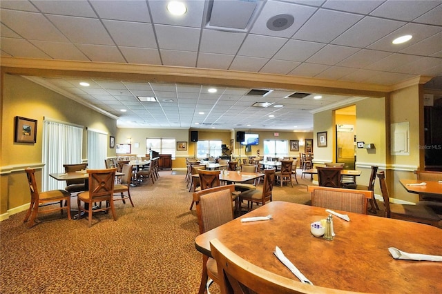 carpeted dining area with baseboards, ornamental molding, visible vents, and recessed lighting