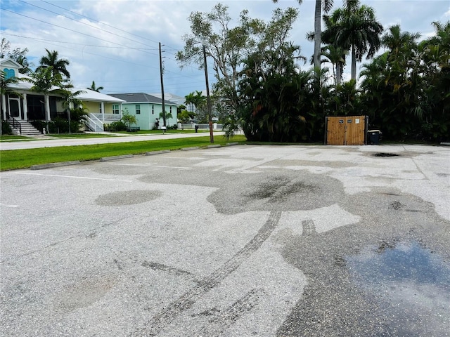 view of road with a residential view