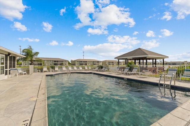 view of swimming pool with a gazebo