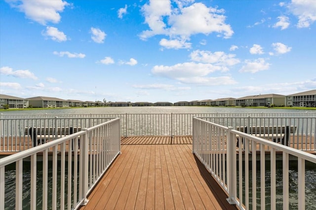 wooden terrace featuring a residential view