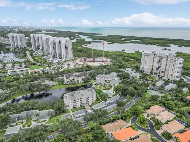 aerial view featuring a water view and a city view