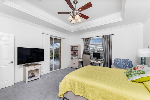 carpeted bedroom with access to outside, a raised ceiling, ceiling fan, and ornamental molding