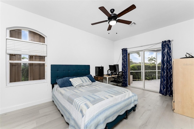 bedroom with light hardwood / wood-style flooring and ceiling fan