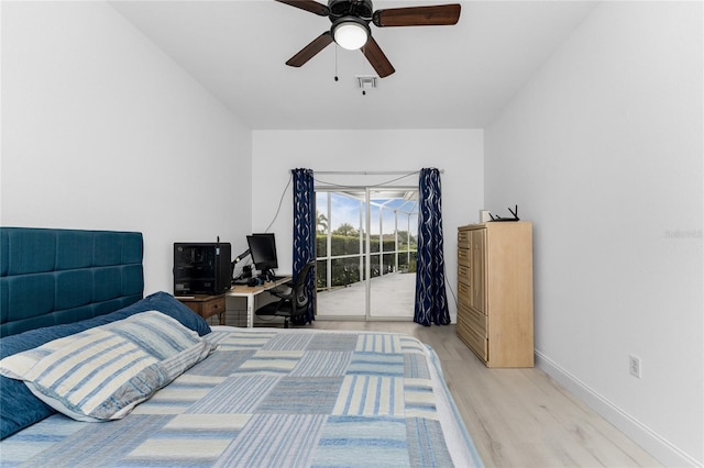 bedroom featuring access to exterior, light wood-type flooring, and ceiling fan