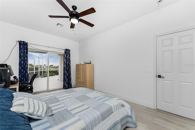 bedroom featuring light wood-type flooring, access to outside, and ceiling fan