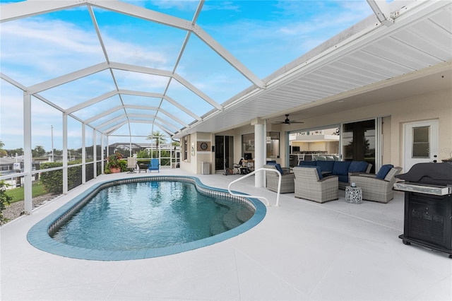 view of pool featuring outdoor lounge area, a lanai, and a patio area