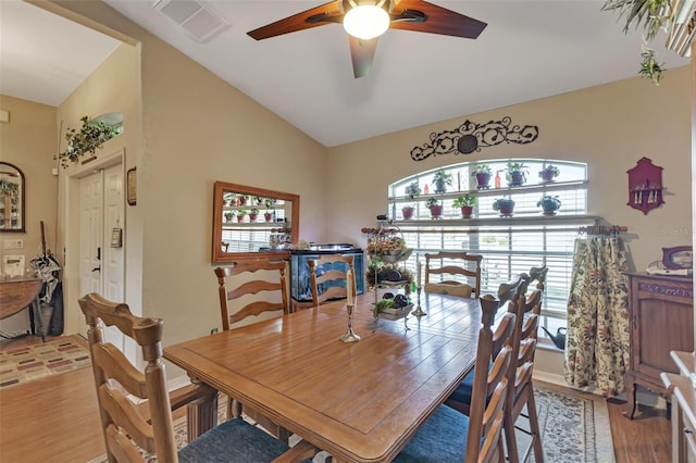 dining room featuring light hardwood / wood-style flooring, ceiling fan, and a healthy amount of sunlight