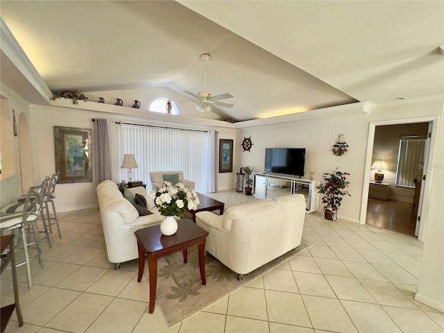 tiled living room featuring crown molding, ceiling fan, and vaulted ceiling