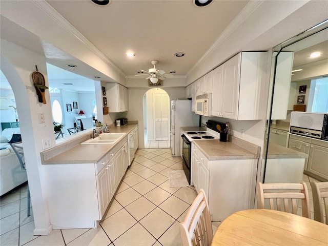 kitchen featuring ornamental molding, white cabinetry, white appliances, ceiling fan, and light tile patterned flooring