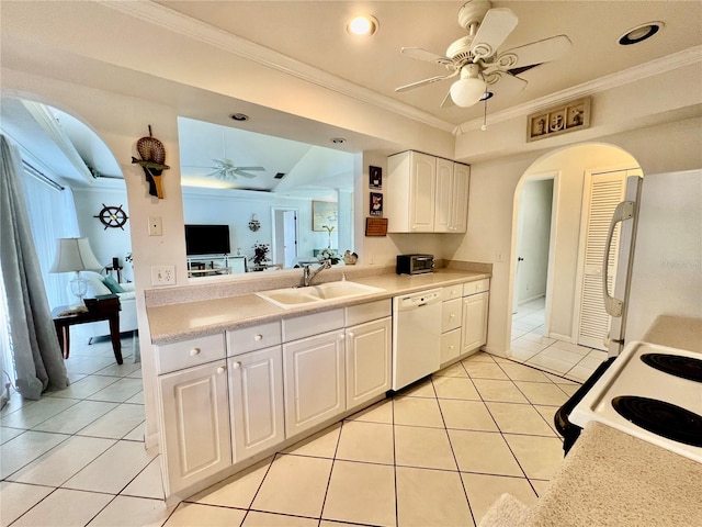 kitchen with crown molding, white appliances, sink, ceiling fan, and white cabinets