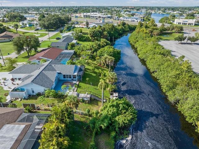 bird's eye view with a water view