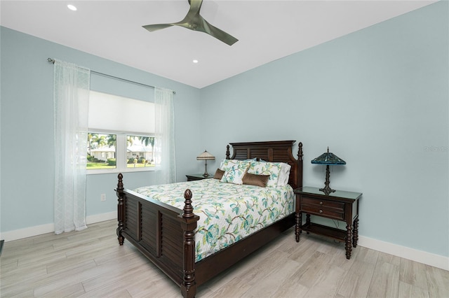 bedroom featuring light wood-type flooring and ceiling fan