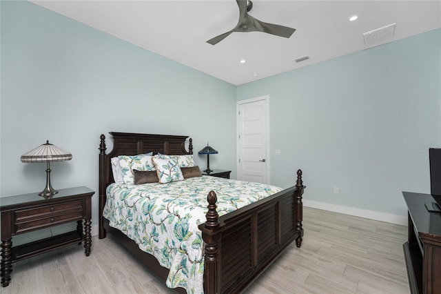 bedroom featuring light wood-type flooring and ceiling fan